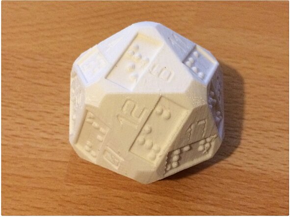 White 20-sided dice with additional braille numbers Braille 20-sided dice. Fotocredit: idellwig on Thingiverse