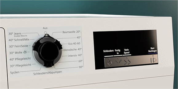 Der sprechende Knopf von Feelware (c) Feelware. Anzeige von Waschmaschine mit haptischen Symbolen und schwarzem Drehknopf